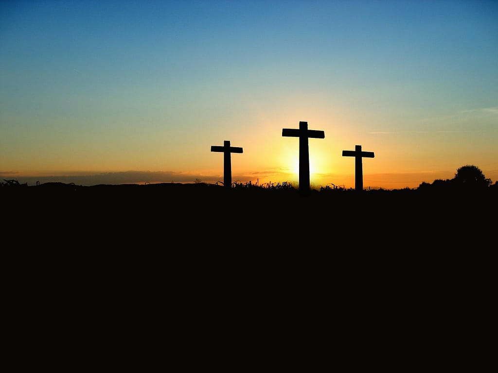 3 crosses on Hill, sunset Christian Beliefs Trinity
