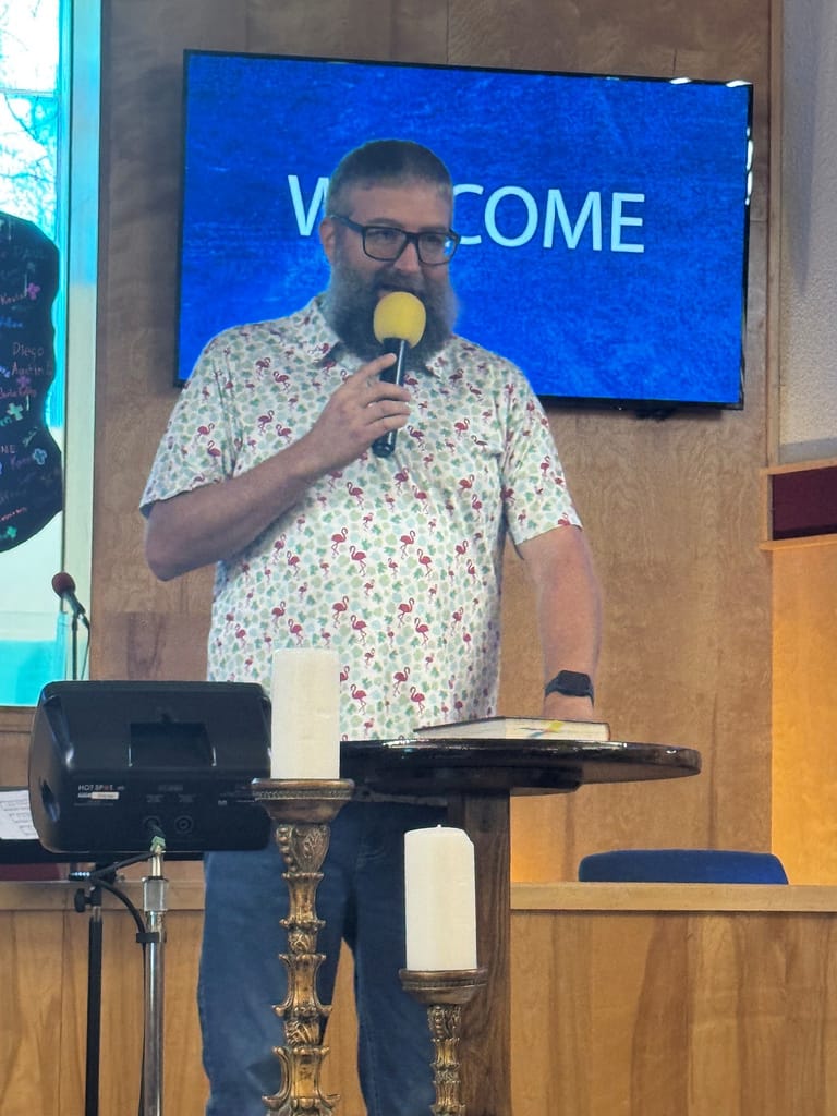 Pastor Ollie sharing about the Prayer Tree